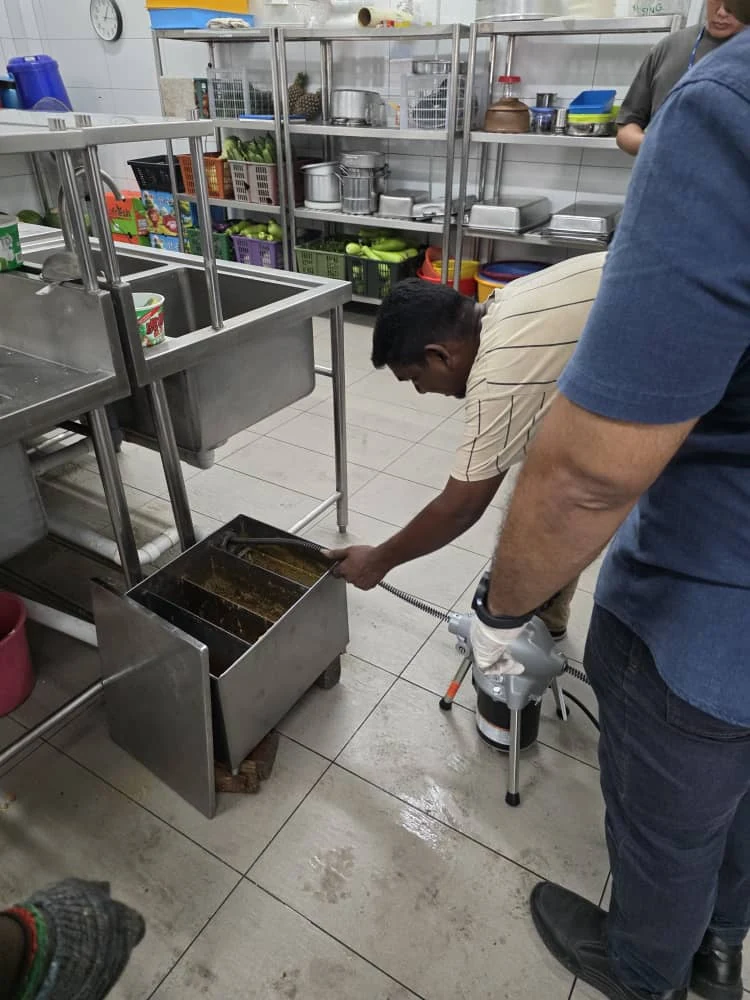 Grease trap servicing at a steel processing plant in Klang